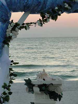 Beach wedding arch on Anna Maria Island at White Sands Beach Resort